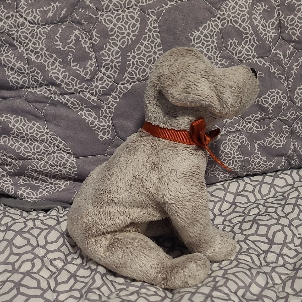 Plush Dog Toy with Red Bow